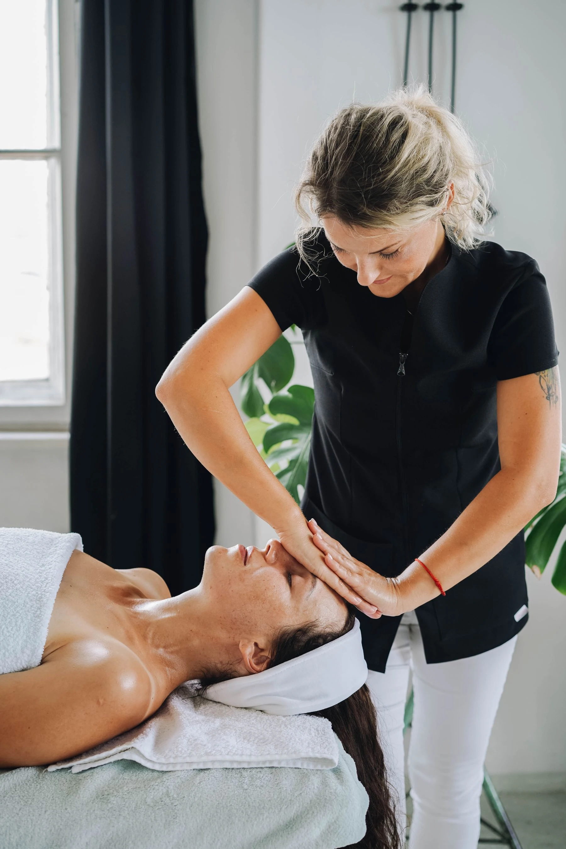 Forehead massage during facial therapy